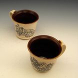 Pair Of Pottery Coffee Mugs With Drawings Of Black Flowers 2 small