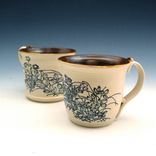 Pair Of Pottery Coffee Mugs With Drawings Of Black Flowers 4 small