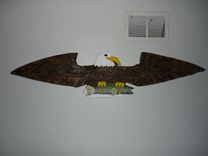 Chainsaw Carved Relief Carving Of An Eagle Holding A Fish 2 small