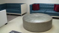Custom Built Sofas In Driftwood With Custom Whitewash Finish And Metal For The University House In Fullerton, Ca - 60" Round Ottoman In Vinyl With Center Button 2 small