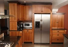 Craftsman Style Kitchen In Cherry With Black Walnut Crown. 1 small