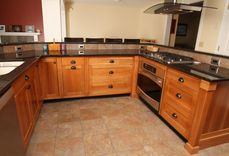 Craftsman Style Kitchen In Cherry With Black Walnut Crown. 3 small