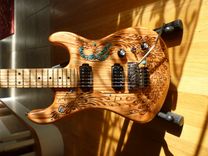 Hand Carved Peacock Electric Guitar With Turquoise Accents 1 small