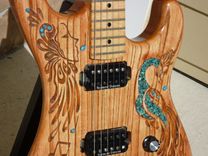 Hand Carved Peacock Electric Guitar With Turquoise Accents 6 small