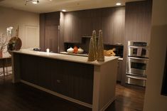 Beautiful Custom Kitchen With Walnut Panels 1 small