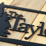 Personalized Rectangular Metal Family Name Sign with Pine Trees 2 small